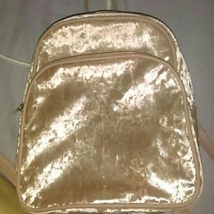 A mini blush colored bag